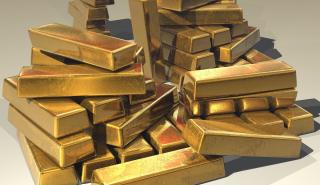Απώλειες για χρυσό λόγω Fed, ομολόγων και δολαρίου