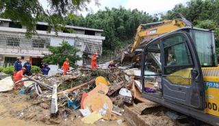 Κίνα: Δώδεκα νεκροί από κατολίσθηση στο νότιο τμήμα της χώρας μετά τις συνεχιζόμενες ισχυρές βροχοπτώσεις