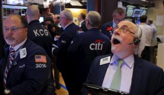 Με το «πόδι στο γκάζι» οι αγοραστές στη Wall Street - «Τρελή κούρσα» ο Dow στον καλύτερο μήνα από το 1976
